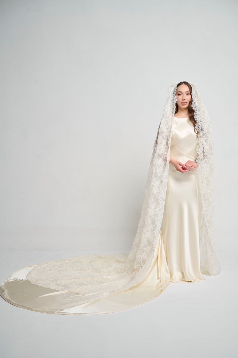 A Cathedral Length Corded Couture Lace Veil. A Cathedral Length Corded Couture Lace Veil.