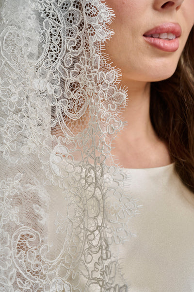 A Cathedral Length Corded Couture Lace Veil.