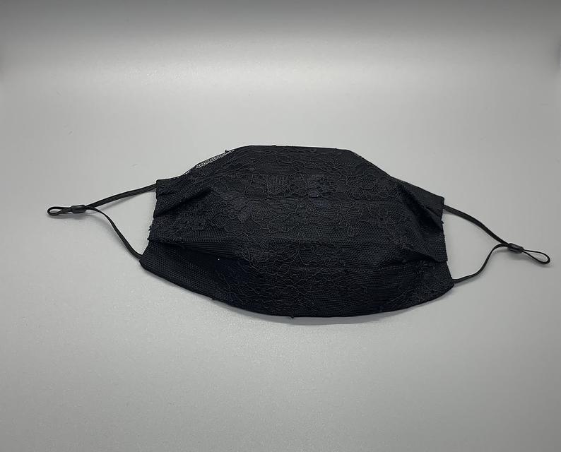 Pleated Ivory French Lace with adjustable band & nose clip.